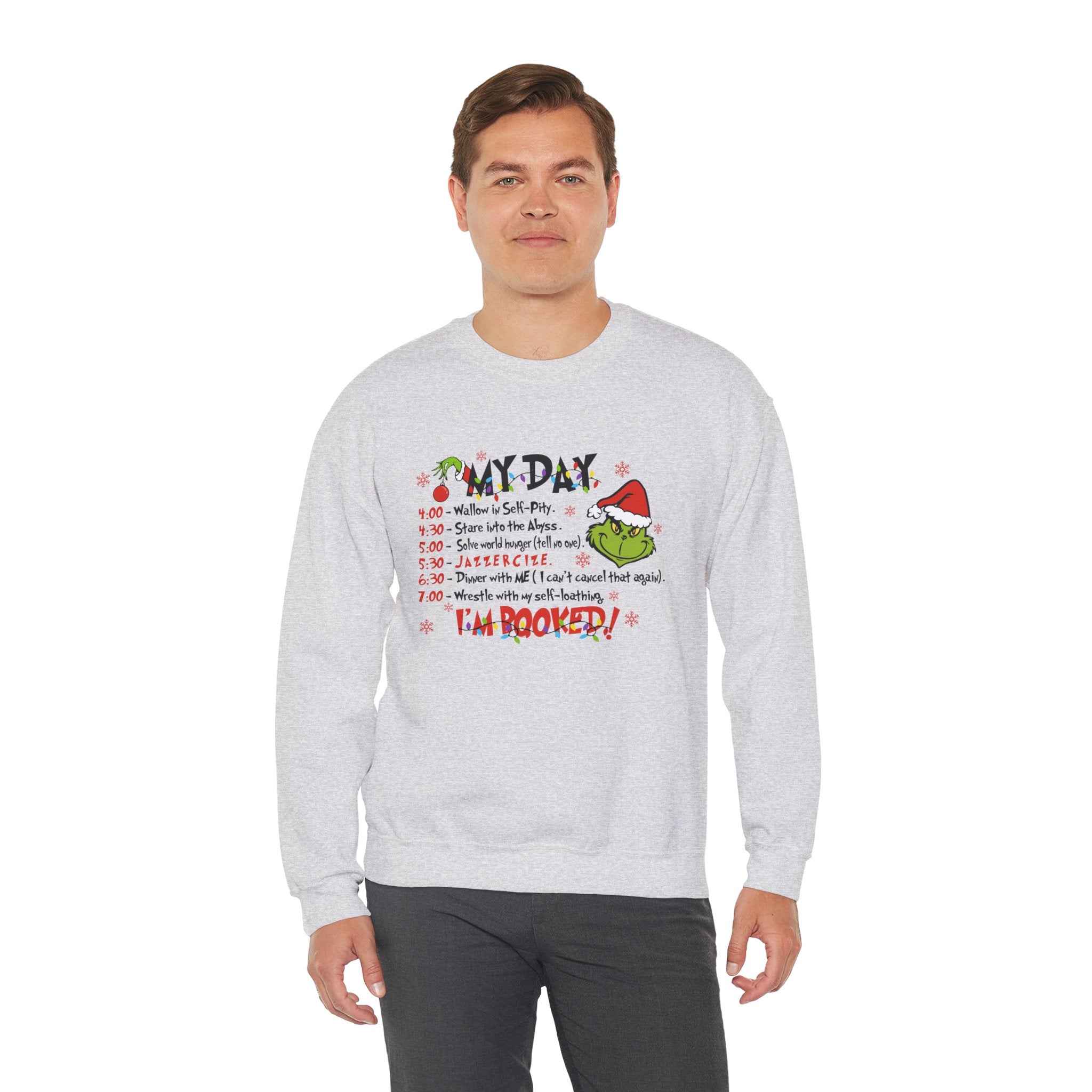 Grinch Holiday Schedule Sweatshirt — "My Day... I Am Booked!" Christmas Crewneck by Printify