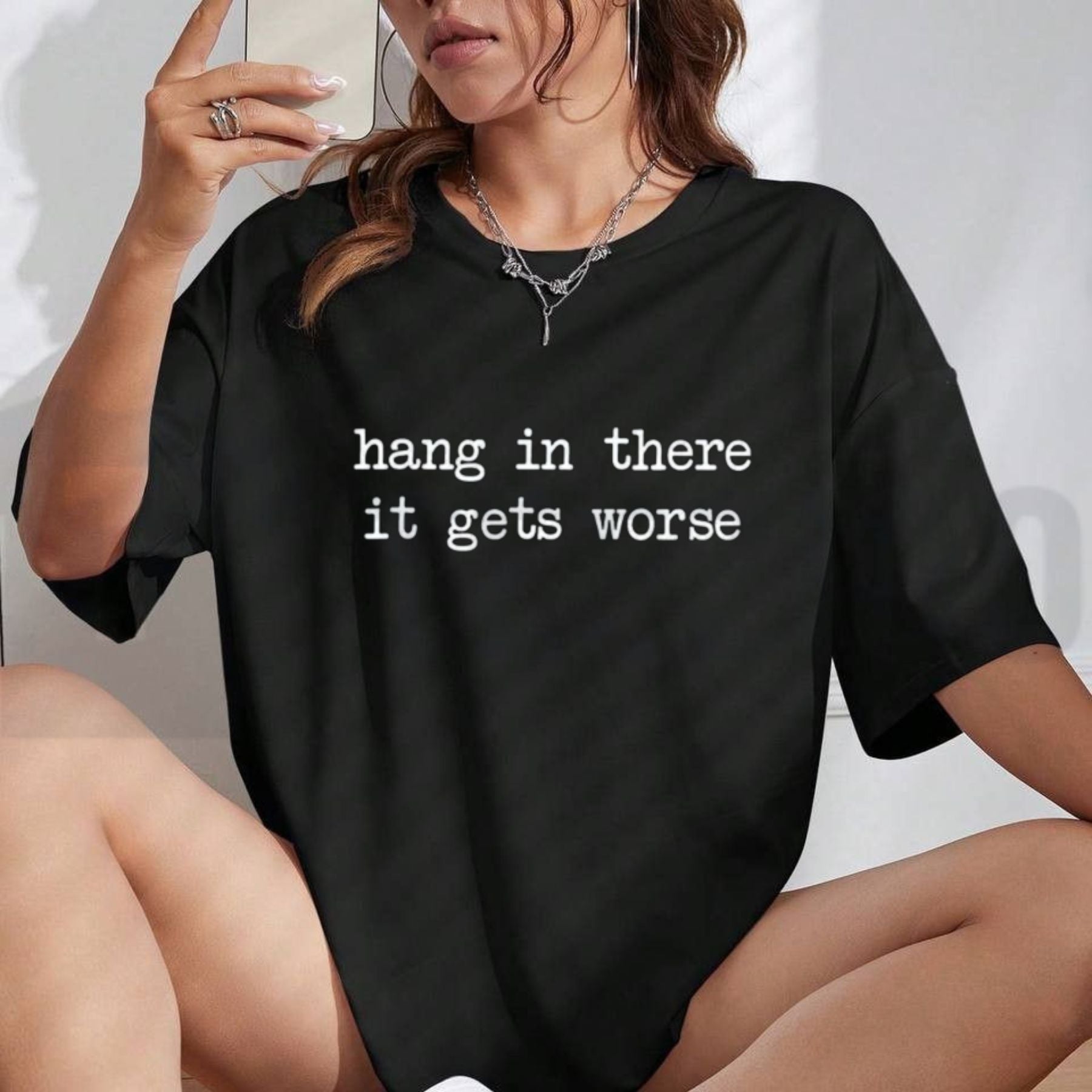 Hang In There It Gets Worse Tee – Funny Sarcastic Mental Health Humour Shirt by Teezioo