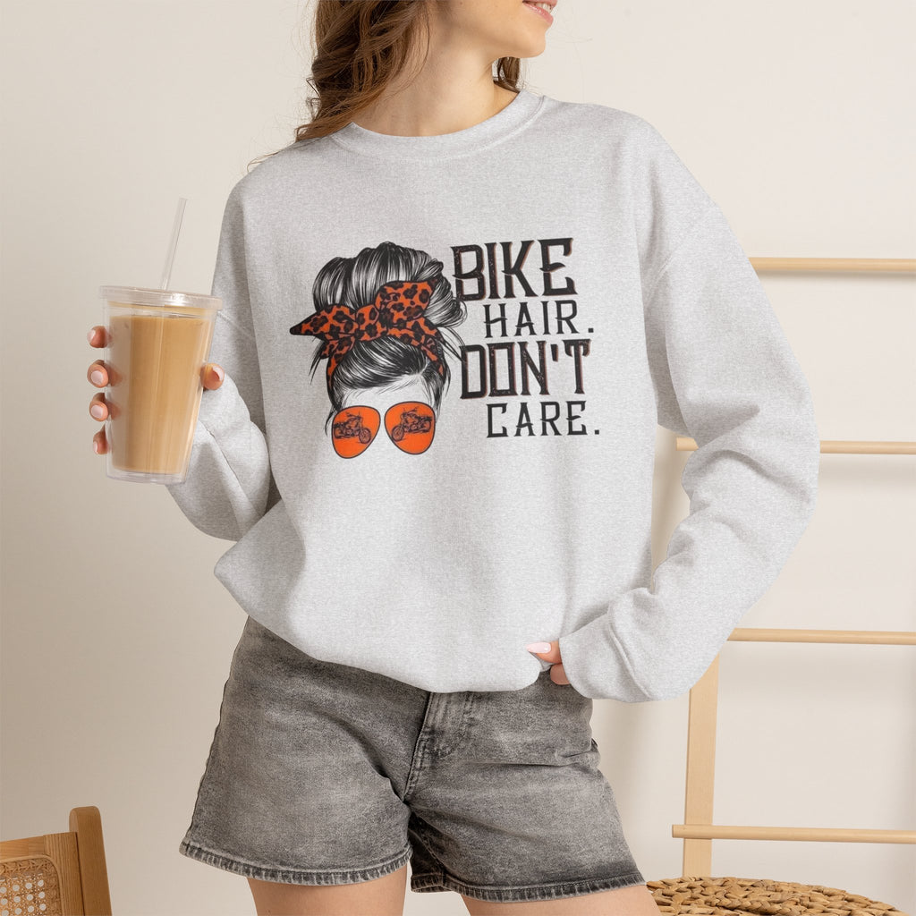 Crewneck Sweatshirt — “Bike Hair Don’t Care” Biker Messy Bun Graphic by Printify