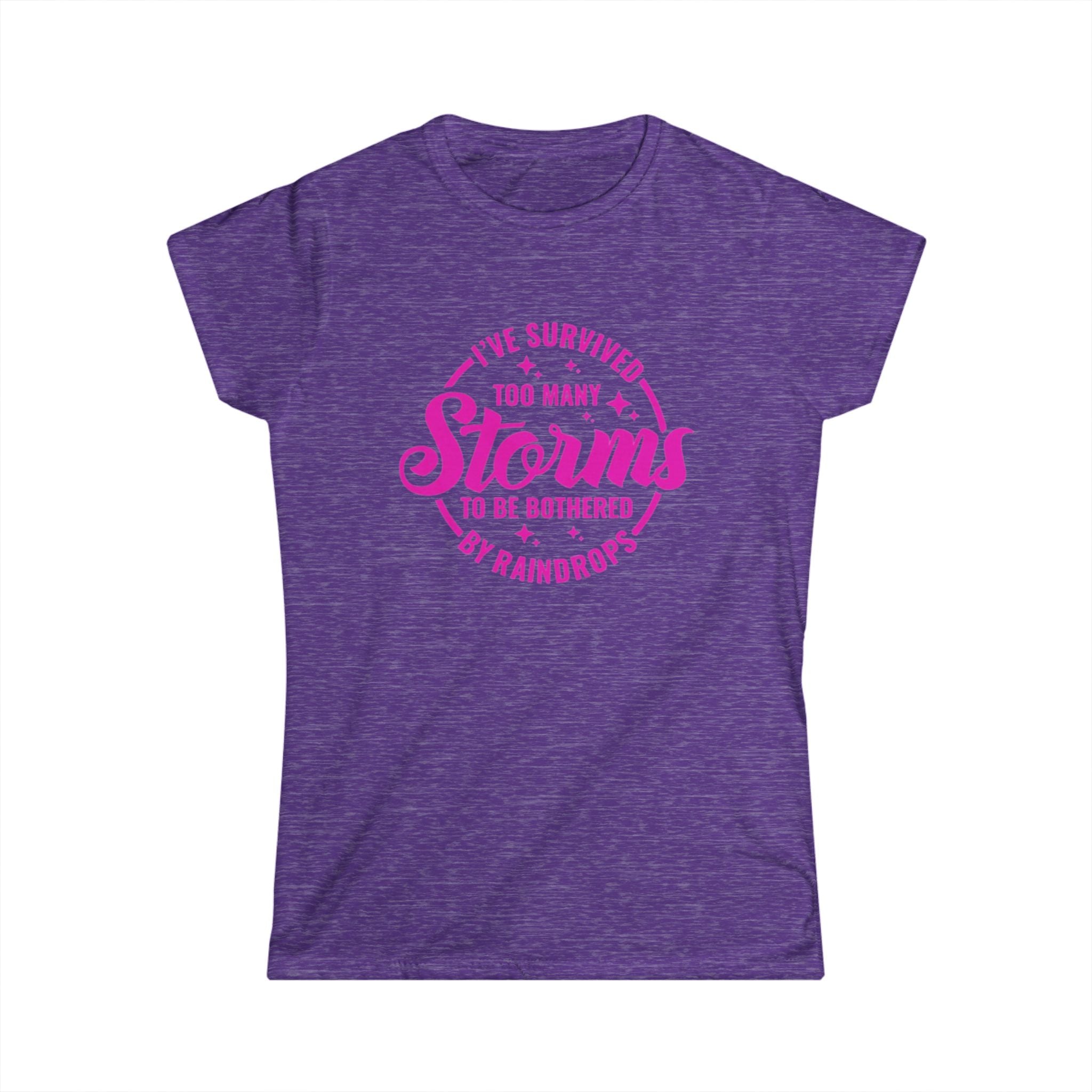 Women's Tee — "I've Survived Too Many Storms to Be Bothered by Raindrops" Inspirational Pink Graphic by Printify