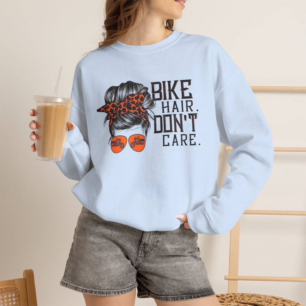 Crewneck Sweatshirt — “Bike Hair Don’t Care” Biker Messy Bun Graphic by Printify