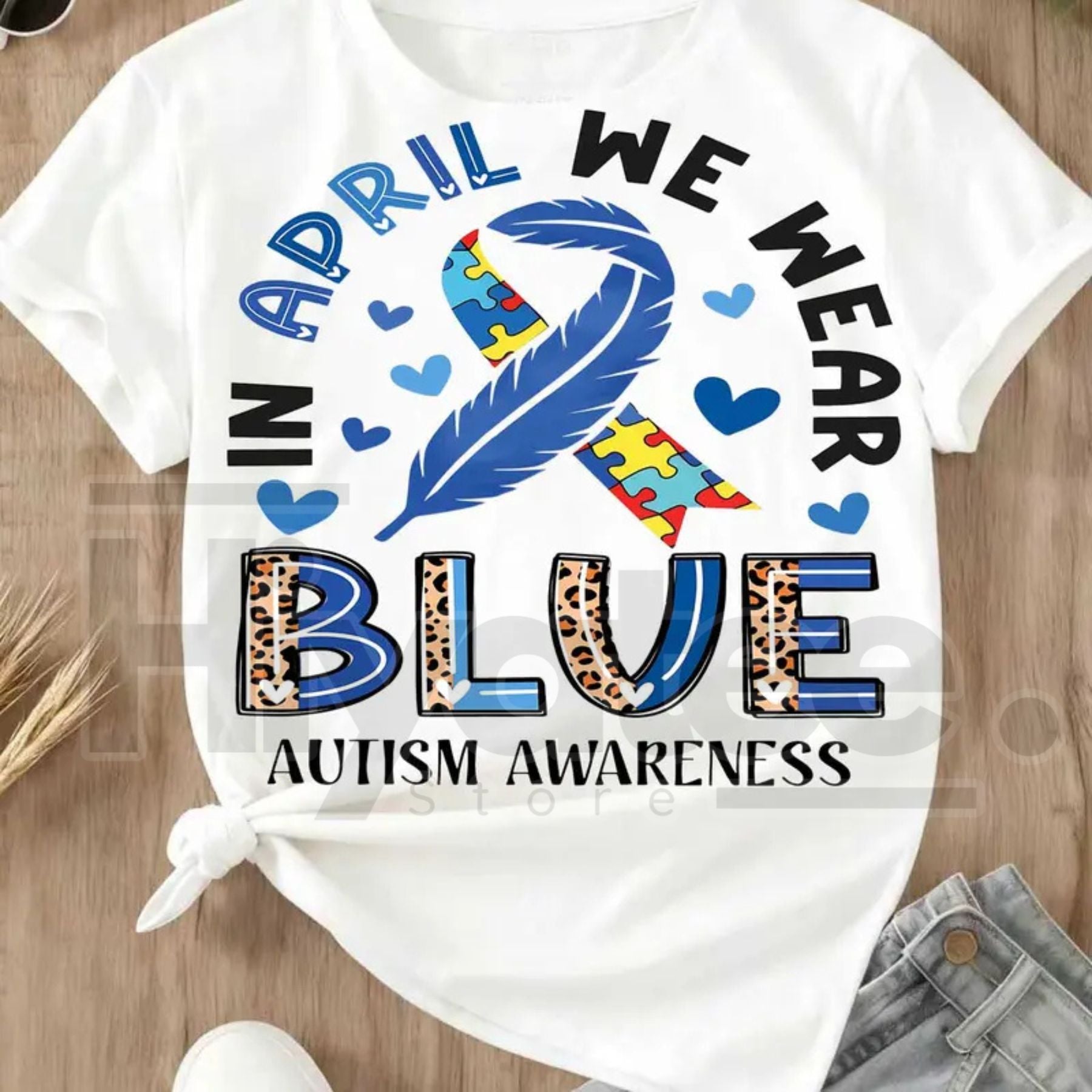 "In April We Wear Blue" Autism Awareness – Ribbon Puzzle Piece Women's Top by Hiyatee
