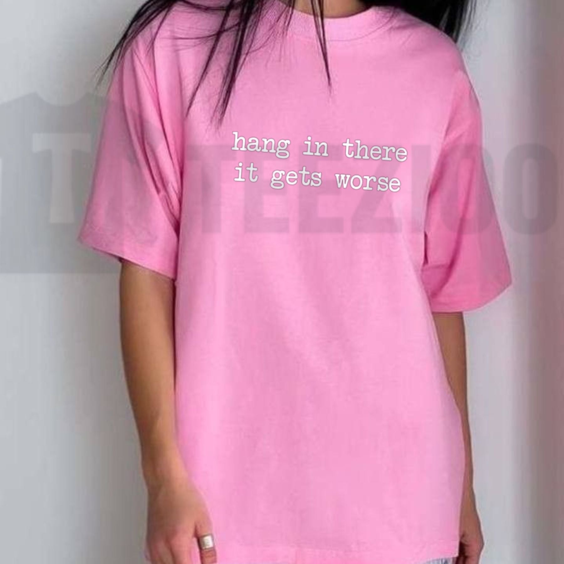 Hang In There It Gets Worse Tee – Funny Sarcastic Mental Health Humour Shirt by Teezioo