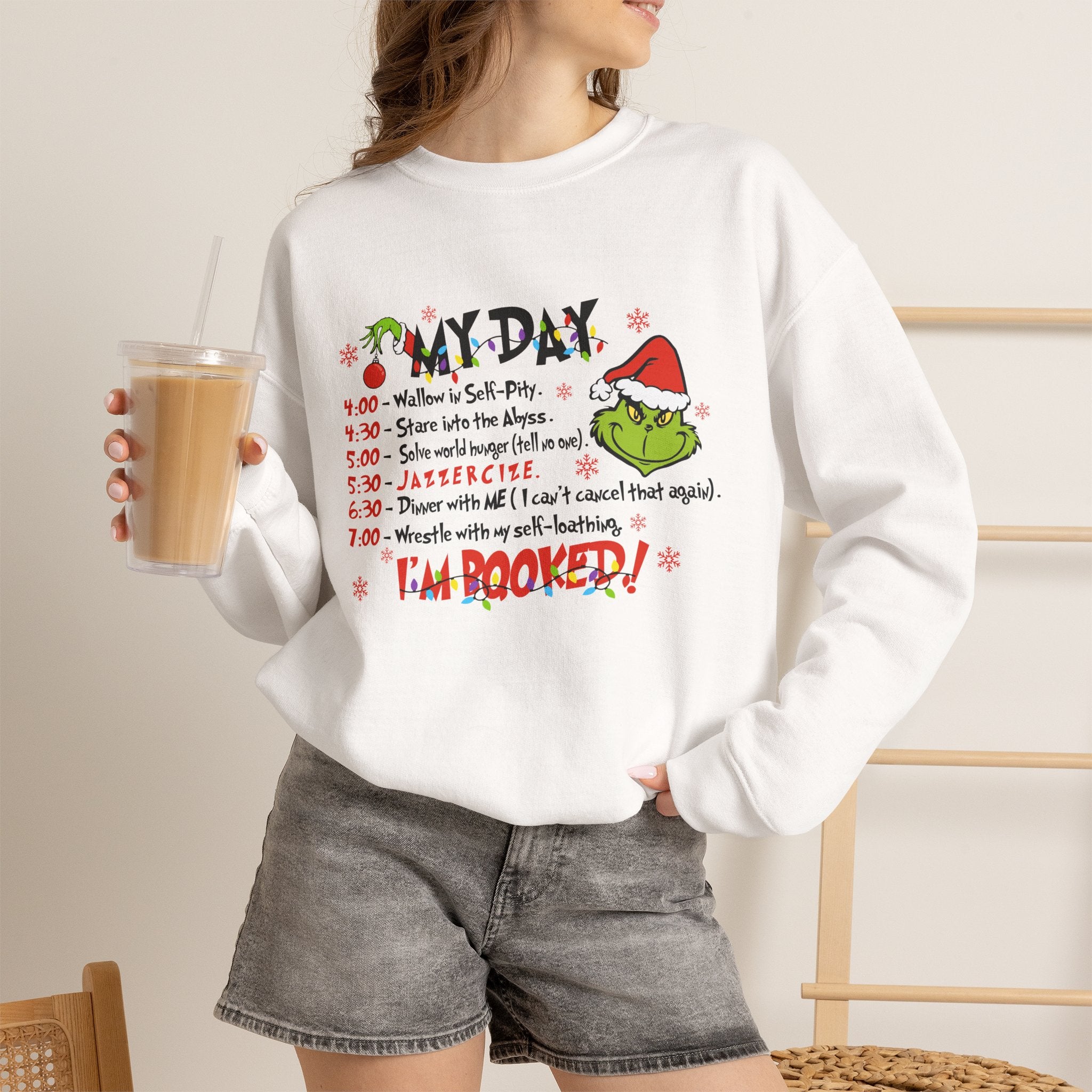 Grinch Holiday Schedule Sweatshirt — "My Day... I Am Booked!" Christmas Crewneck by Printify