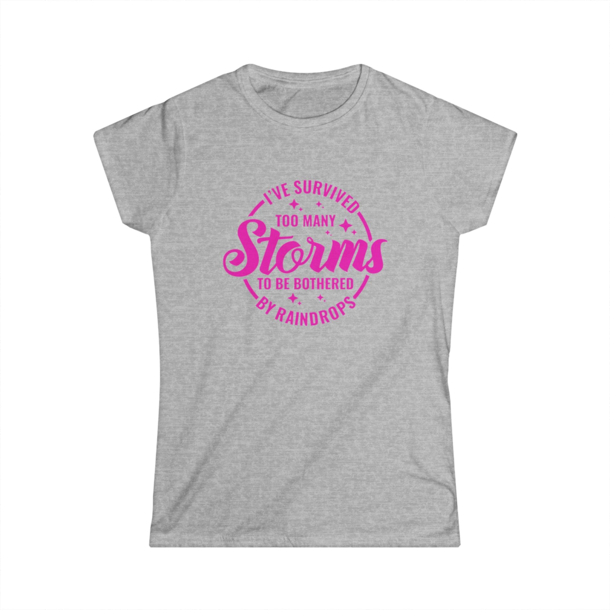 Women's Tee — "I've Survived Too Many Storms to Be Bothered by Raindrops" Inspirational Pink Graphic by Printify